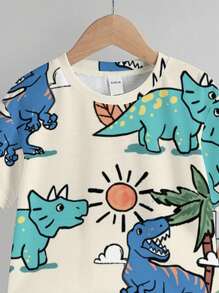 SHEIN Set de 2 piezas de camiseta de manga corta de cuello redondo con estampado de dibujos animados y pantalones cortos casual para niños, verano
