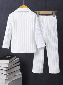 Completo casual per ragazzo, composto da camicia a maniche lunghe e pantaloni in un unico colido