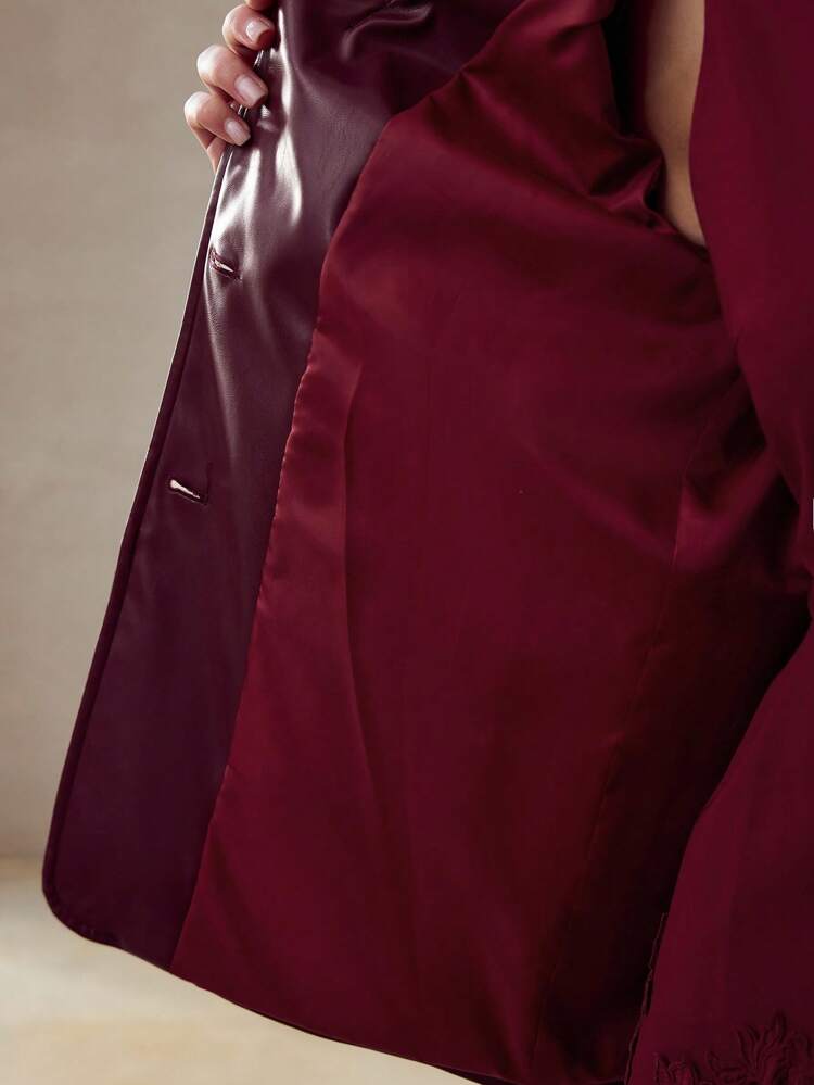 Blazer en PU avec col châle, poche appliquée et ceinture