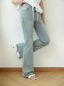 K-Vae Women's Light Wash Denim Flared Jeans With Sparkly Rhinestone Embellishments. Stylish Extra Long Bell Bottom Jeans For A Look.