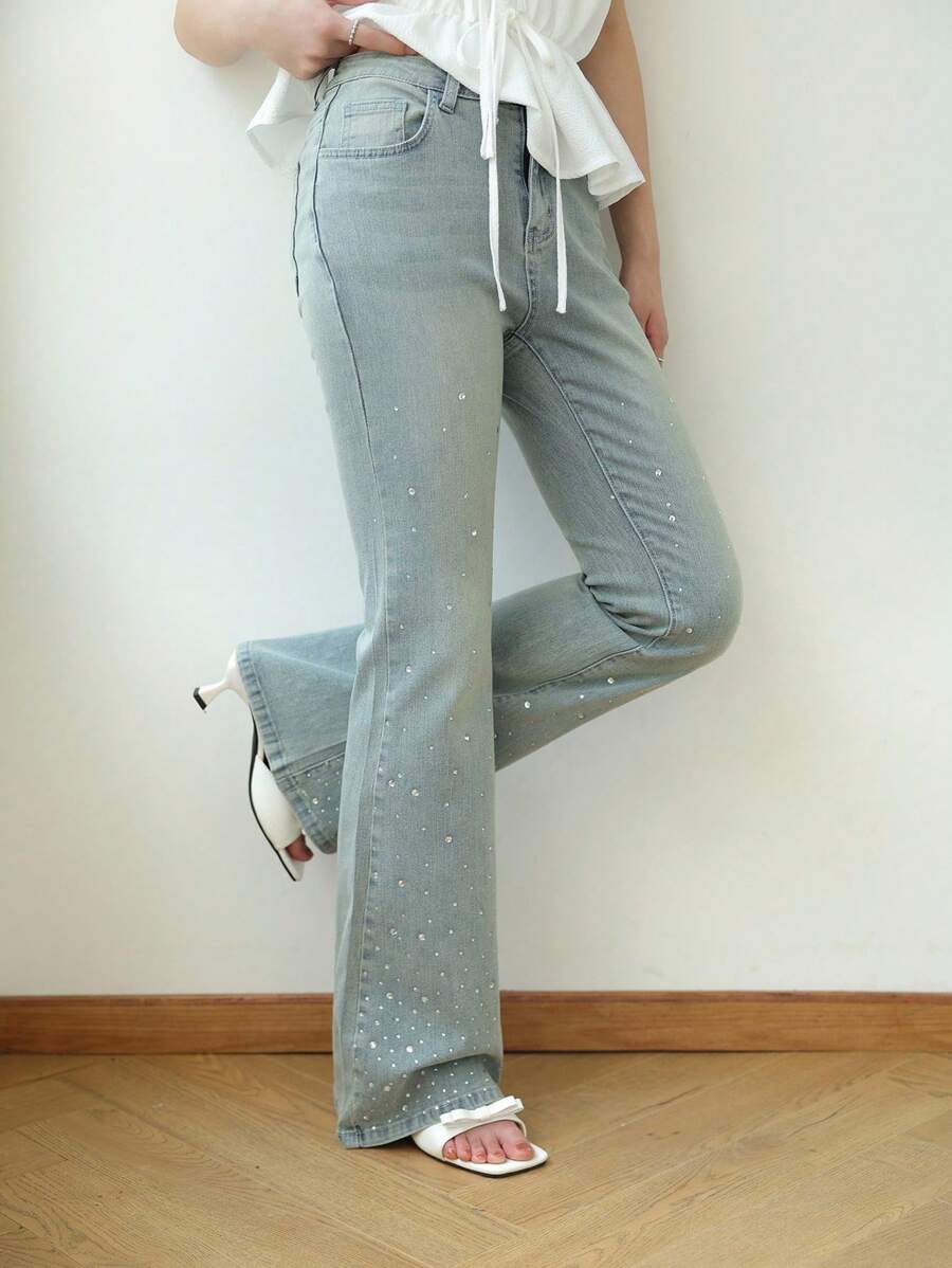 K-Vae Women's Light Wash Denim Flared Jeans With Sparkly Rhinestone Embellishments. Stylish Extra Long Bell Bottom Jeans For A Look.