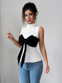 Rafferiza Elegancki damski sweter bez rękawów z kolorowymi blokami i kokardą - Czarne i Białe - Zobacz 7