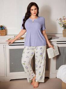 CottageSlumber CottageSlumber طقم بيجامات بمقاس كبير من قماش مضلع، مزين بطبعة زهرية على الياقة، توب بأكمام قصيرة وبنطال واسع