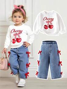 SHEIN Playful Pals 2 件套年轻女孩休闲樱桃蝴蝶结印花针织运动衫和牛仔裤套装，适合秋季/春季