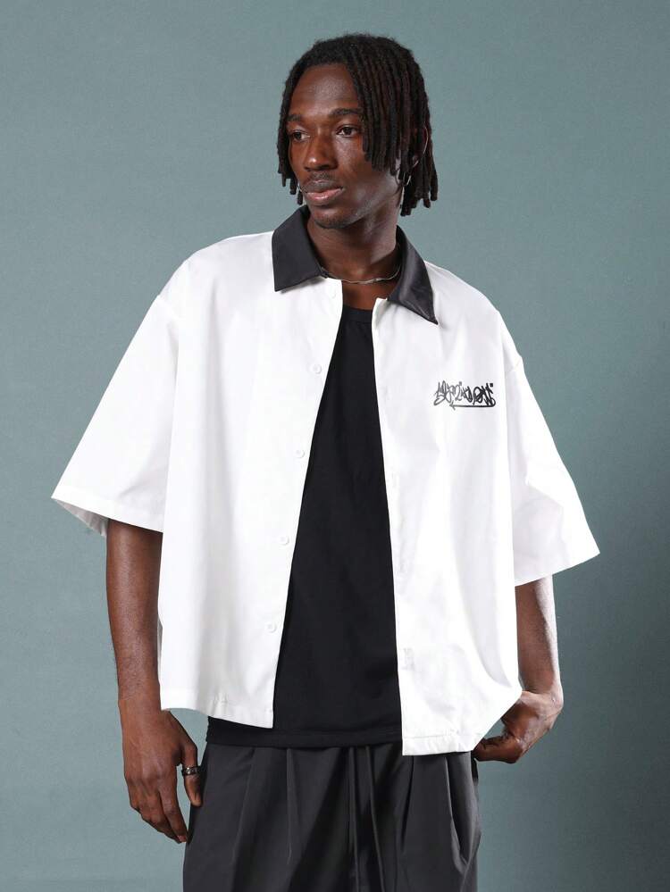 Chemise de bowling oversize à manches courtes et imprimé graphique avec col noir