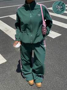 Muchica Conjunto de dos piezas para mujer de chaqueta y pantalones deportivos con bloqueo de color y diseño a rayas tejidos