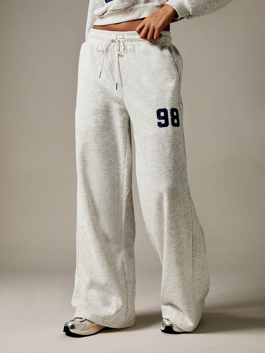 MISSGUIDED Quần nỉ ống rộng Jersey Quần thể thao Athleisure Varsity Số Thể thao Dây rút Đồ mặc nhà cho sinh viên Đồ mặc thoải mái Đồ thể thao mọi mùa Đồ mặc thường ngày Đồ dùng thiết yếu hàng ngày - Xám - Xem 1
