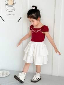 SHEIN Conjunto informal de 2 piezas para niñas jóvenes con camiseta de manga corta con decoración de lazo y falda, color burdeos con volantes - Multicolor - Ver 6