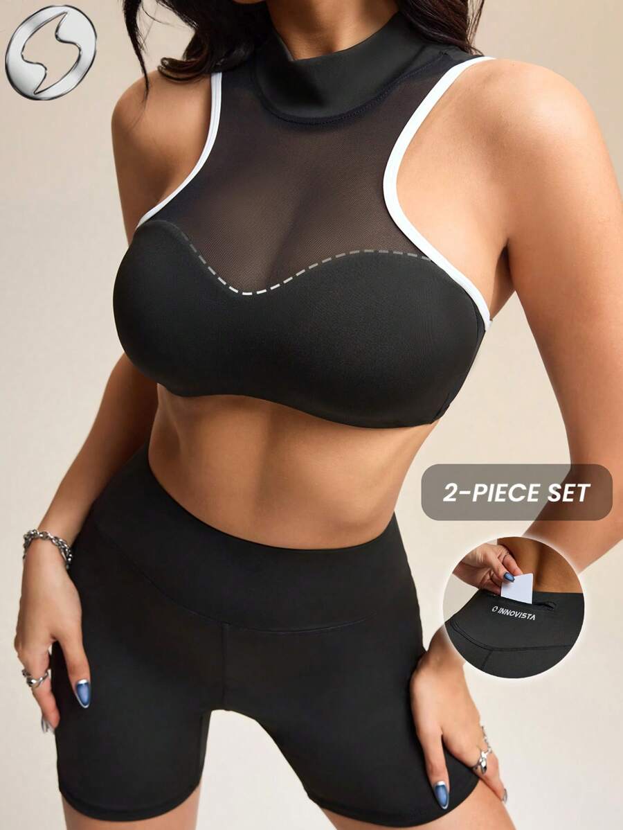 Innovista Bộ đồ thể thao ôm sát và cực kỳ gợi cảm, bộ 2 món/bộ tập gym năng động, bộ đồ tập luyện đồng bộ, áo ngực và quần short, không gây khó chịu khi ngồi xổm, độ co giãn cao và thấm hút mồ hôi, áo mềm mại như bơ và quần thể thao cạp cao, nâng tầm bài tập, vừa vặn tự tin, hiệu suất cao cấp, áo croptop không tay, không gọng, thiết kế lưới khoét và rỗng, bộ đồ thể thao nữ tạo vẻ ngoài thanh lịch, phong cách đường phố năng động. - màu đen - Xem 1