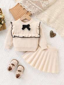 SHEIN 女童时尚可爱百搭蝴蝶结百褶裙毛衣套装，外套，女婴毛衣套装：可爱卡通休闲米色蝴蝶结蕾丝针织毛衣，立体羊毛蝴蝶结贴身蕾丝蝴蝶结毛衣上衣，长袖毛衣，百搭百褶裙，两件套。适合春、秋、冬三季，柔软舒适，适合日常穿着。 - 米色 - 查看 2