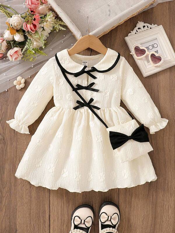 SHEIN 女童优雅简约彼得潘领杏色连衣裙，搭配黑色撞色蝴蝶结装饰，配有同款钱包，秋季