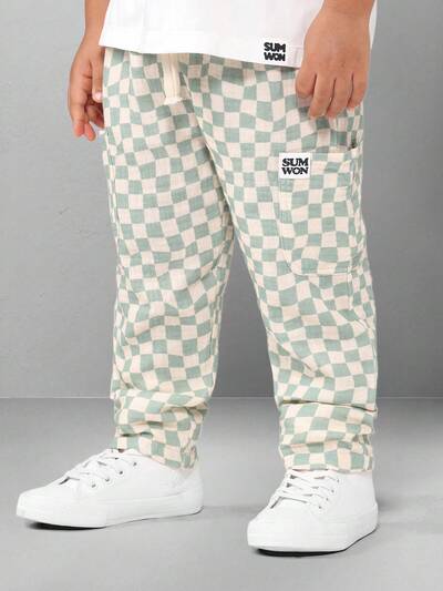 신축성 있는 커프스가 있는 체크 무늬 풀온 조거 팬츠