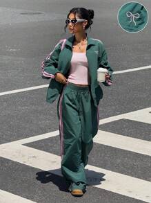 Muchica Conjunto de dos piezas para mujer de chaqueta y pantalones deportivos con bloqueo de color y diseño a rayas tejidos