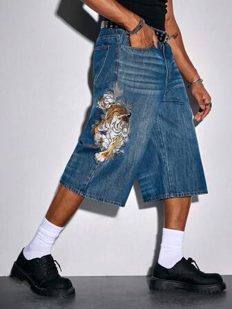 Jeans en denim avec broderie raffinée de tigre pour hommes