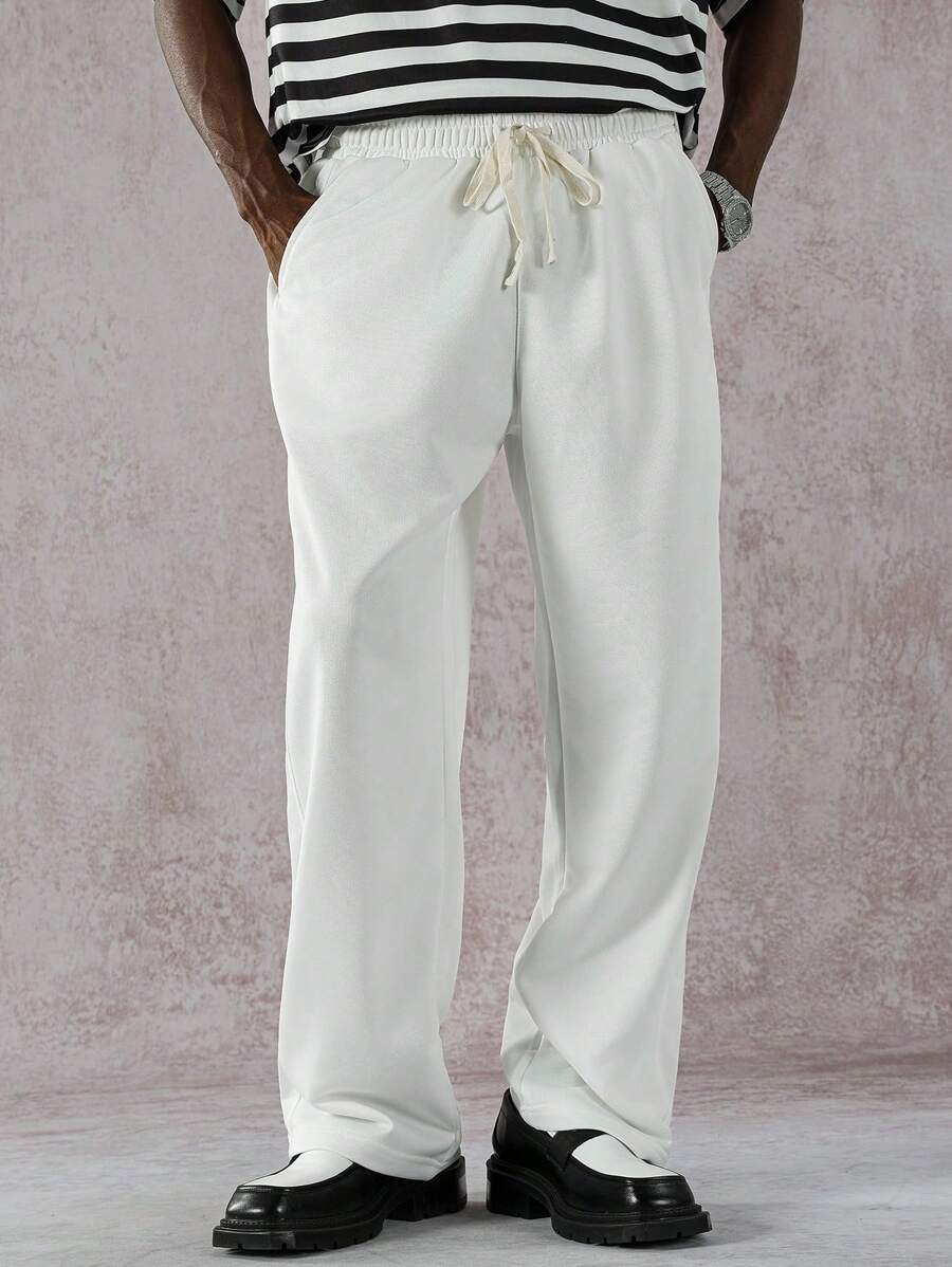 Manfinity EMRG Herren Patchwork Lässig Jogginghose mit Kordelzug Taille und Taschen, locker geschnitten - Weiss - Übersicht 1