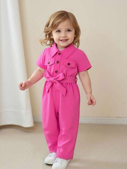 SHEIN Playful Pals 1 pieza Mono de manga corta con botones a presión y cuello de solapa para bebé niña, mono versátil de moda casual con estilo vintage y cinturón, nuevo lanzamiento de verano