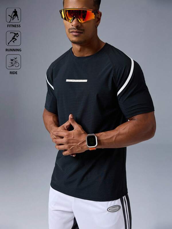 Manfinity Sport Polished Camiseta deportiva de manga corta con cuello redondo y mangas raglán con estampado de letra para hombre