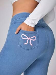 Flexra Plus Size Women Bowknot Elastic Fitted Pants - Medium Wash - View 3
