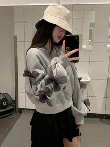 DAZY بلوزة كاجوال فضفاضة بياقة مستديرة وأكمام طويلة منسدلة مع زخرفة فيونكة، مناسبة للخريف والشتاء