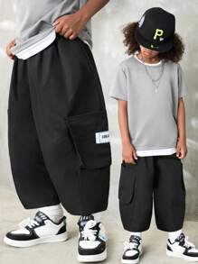 SHEIN Tween Boys Spring/Summer Dual Pocket Pants Straight Leg Drawstring Cargo Plain Black,Capri Pants, Modify Leg Shape, Tapered Cuffs - Black - View 5