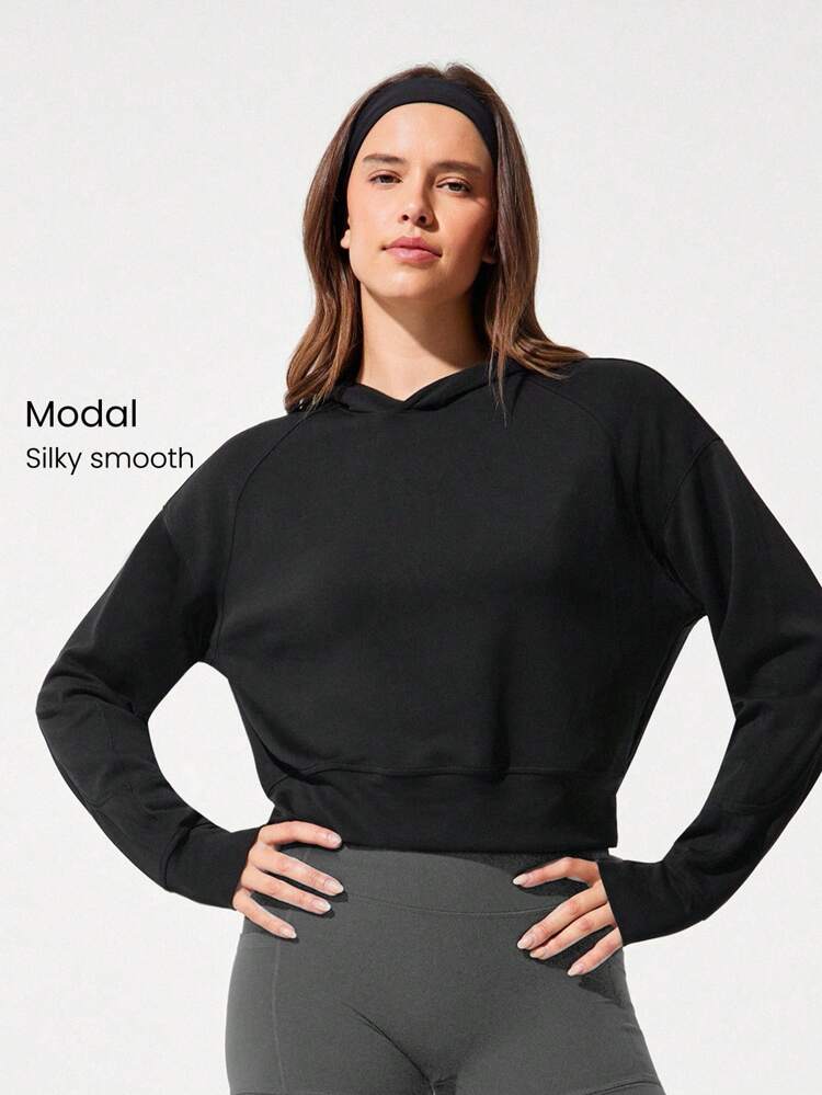 Felpa con cappuccio comoda e aderente in modalità SoftSerene, lunghezza vita, adatta per uso quotidiano e casual