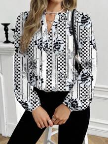 Shutterstock Glamance Camisa de manga larga con estampado floral minimalista y casual para mujer, adecuada para primavera y otoño. Blusa elegante con estampado de pájaros, blusa con estampado floral, blusa de manga larga para mujer, blusa de moda para mujer en otoño. Ropa de mujer para otoño e invierno, ropa de vuelta al colegio y al trabajo. - Negro - Ver 1