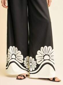 CAJUNI Damskie spodnie z szerokimi nogawkami i czarno-białym nadrukiem kwiatowym – odzież damska w stylu boho/odzież w stylu zachodnim dla kobiet/graficzna/codzienna – podstawowa/bluzki wyjściowe damskie/jesienna odzież damska - Wielokolorowe - Zobacz 4