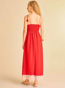 CAJUNI Abito lungo casual da donna in stile boho con stampa tropicale rossa, decorato con nappine, a spalline, con inserti in pizzo sul petto e l'orlo, adatto per le vacanze