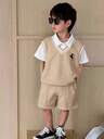 年輕男孩馬球服