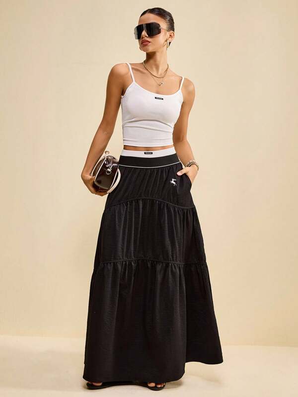 Muvela Women's Vintage Casual Preppy Style Long Embroidered Skirt For Autumn, Perfect For Retro Sporty Looks, Back-To-School, And Stylish Outings