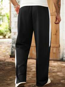 Manfinity Homme Pantaloni della tuta oversize con stampa grafica, stile casual a strati, adatti per il tempo libero, il tragitto casa-lavoro, il ritorno a scuola, le vacanze, un regalo per marito o fidanzato, un set unisex per coppie. - Multicolore - Visualizzare 2