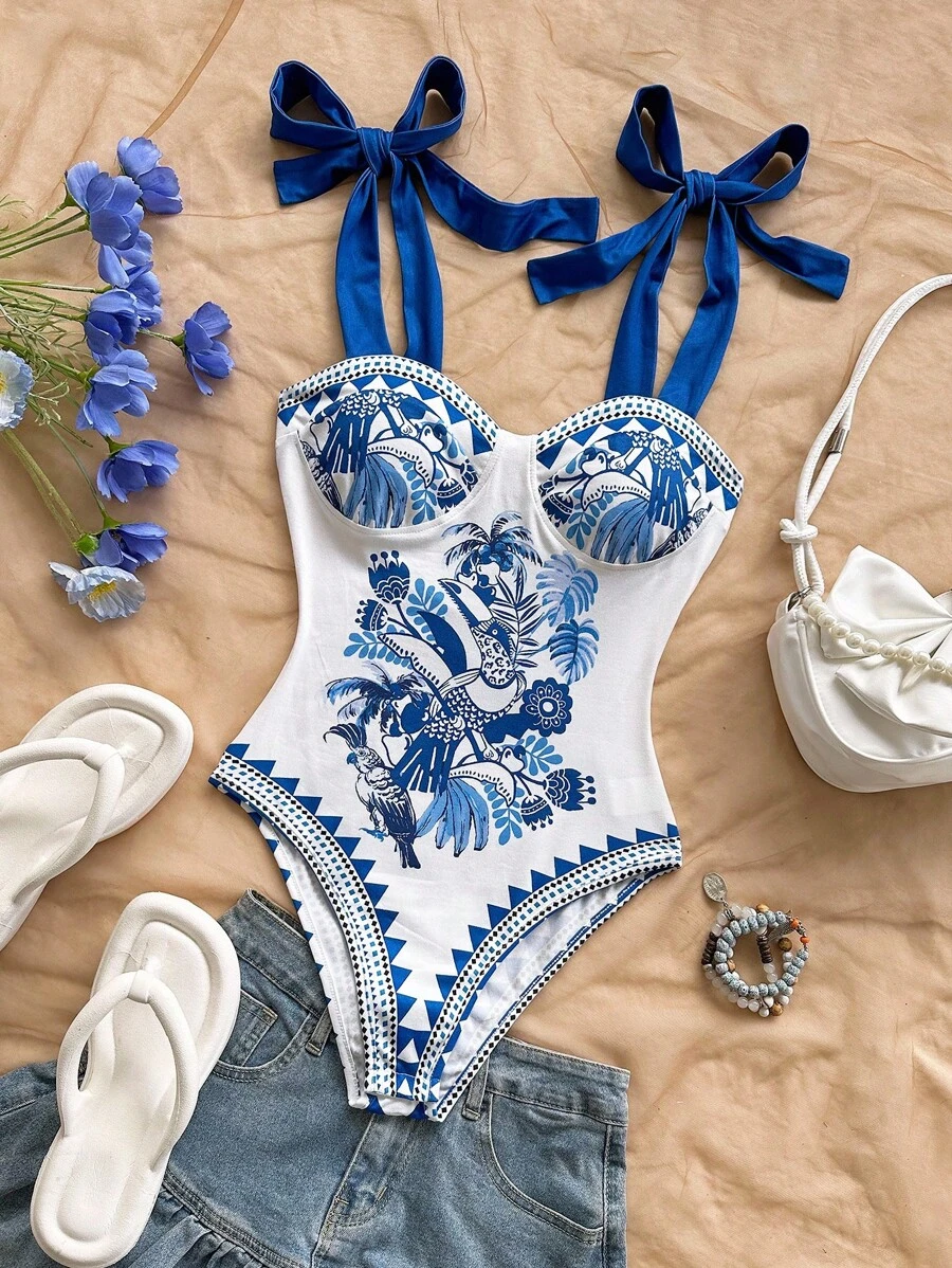 Soleia 女士新款假日系列针织吊带蝴蝶结连体衣，花鸟印花，蓝白配色，适合邮轮、嘉年华等场合，可内搭或外穿。