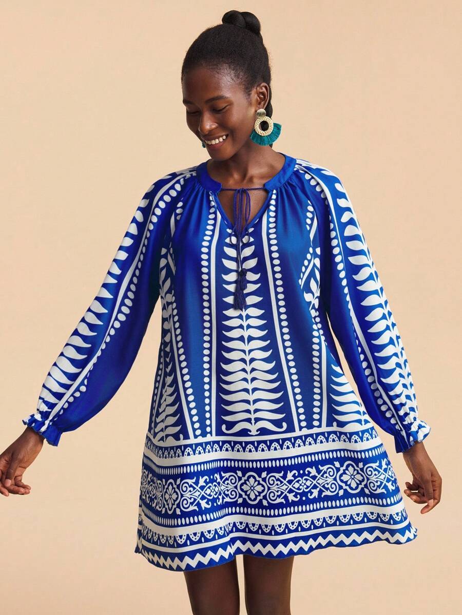 Travachic Women's Royal Blue Autumn Boho Vacation Holiday Plant Graphic Tassel Tie Neck Raglan Sleeve Loose Mini Shift Printed Tunic Blue And White Dress - Blue - View 1