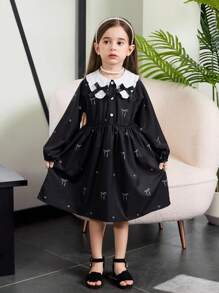 年轻女孩拼色蝴蝶结装饰连衣裙