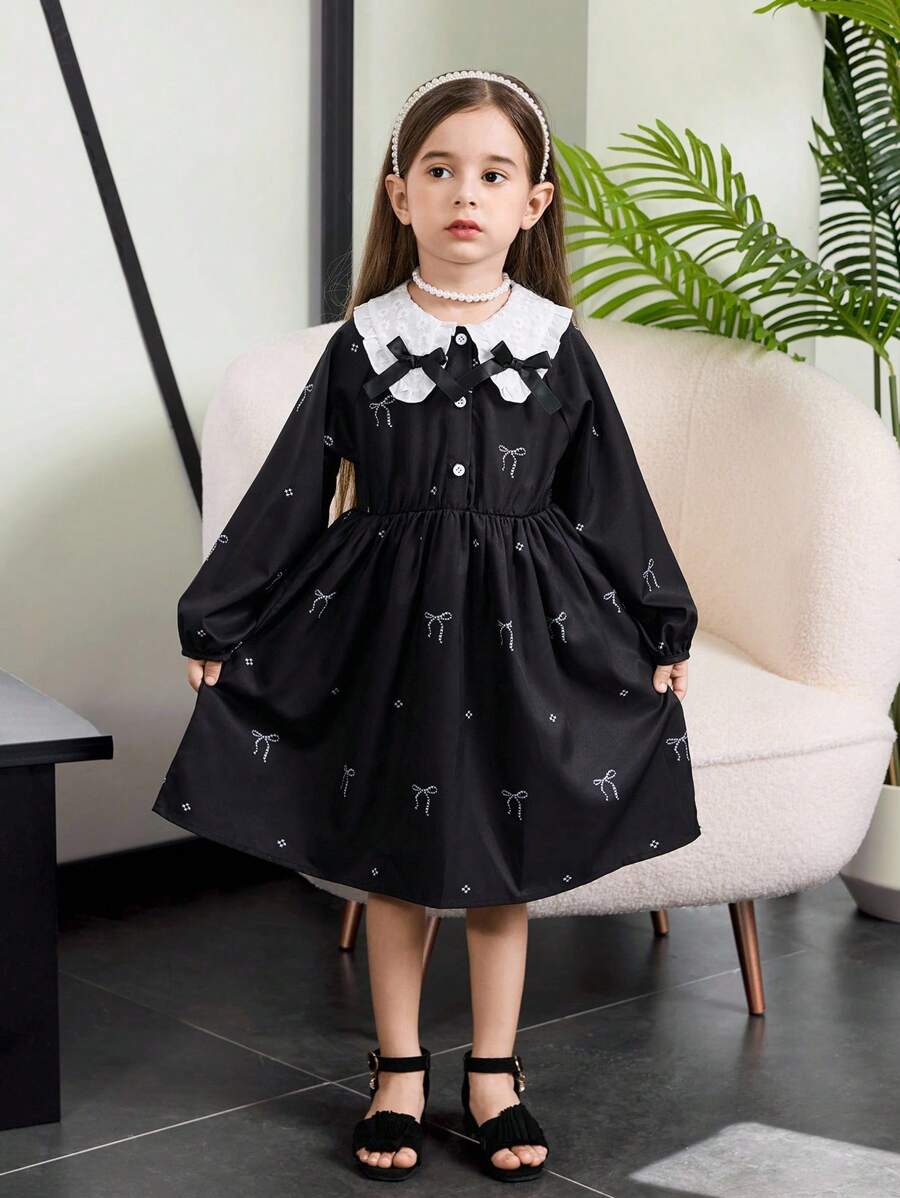 年轻女孩拼色蝴蝶结装饰连衣裙