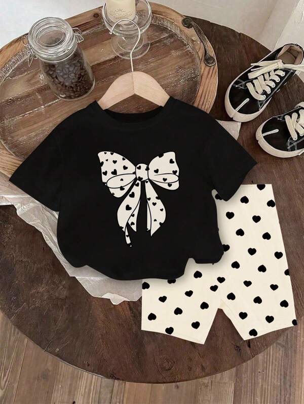 GraphicGems Baby Girls Polka Dot Bow Pattern Round Neck Short Sleeve Black T-Shirt And Heart Print Knitted Tight Shorts Set