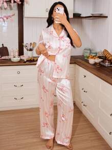 SweetSlumber Set de pijama para mujeres con 2 piezas: Top de manga corta con estampado de lazo y rayas satinado y pantalones