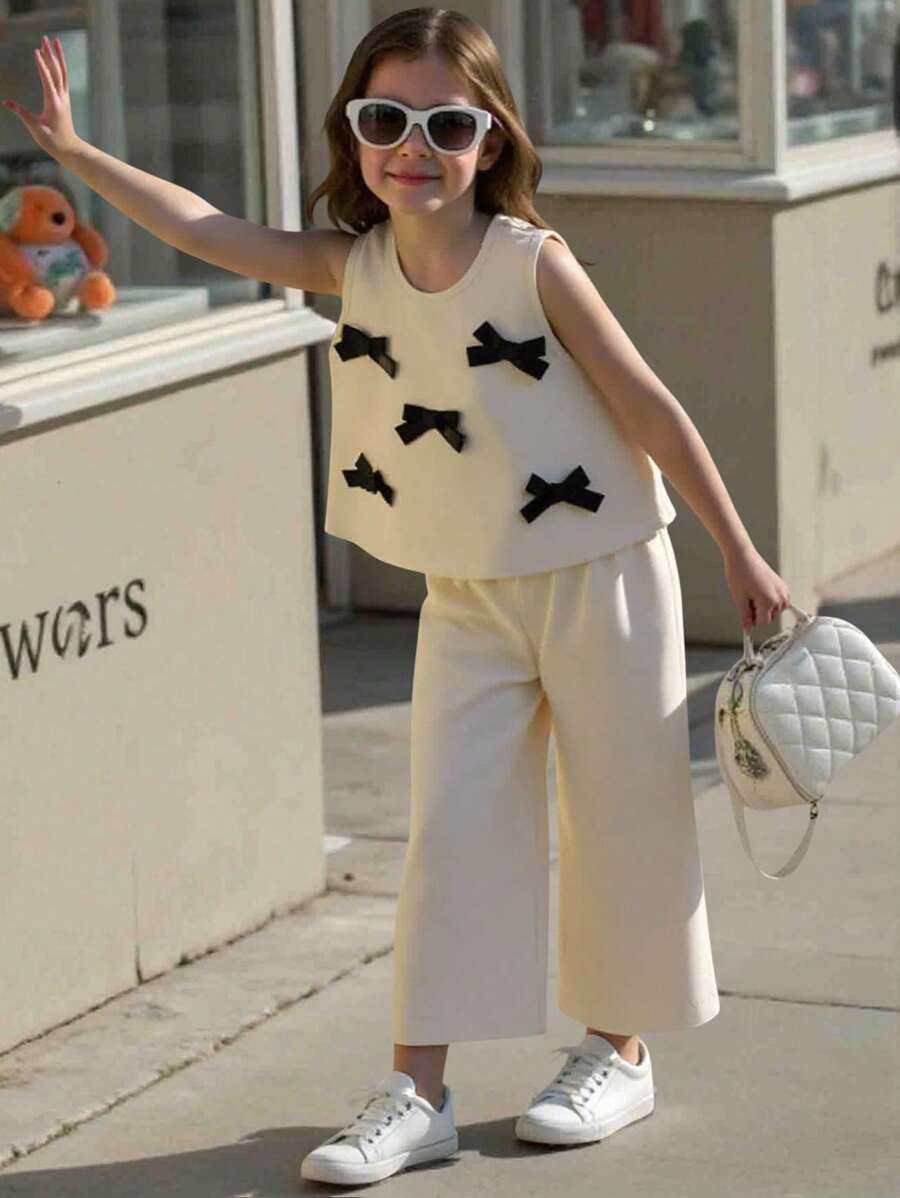 SHEIN Elladie kids 2 件套幼儿女童时尚可爱 3D 蝴蝶结装饰无袖背心和七分裤套装，适合日常穿着、度假和外出，春夏季