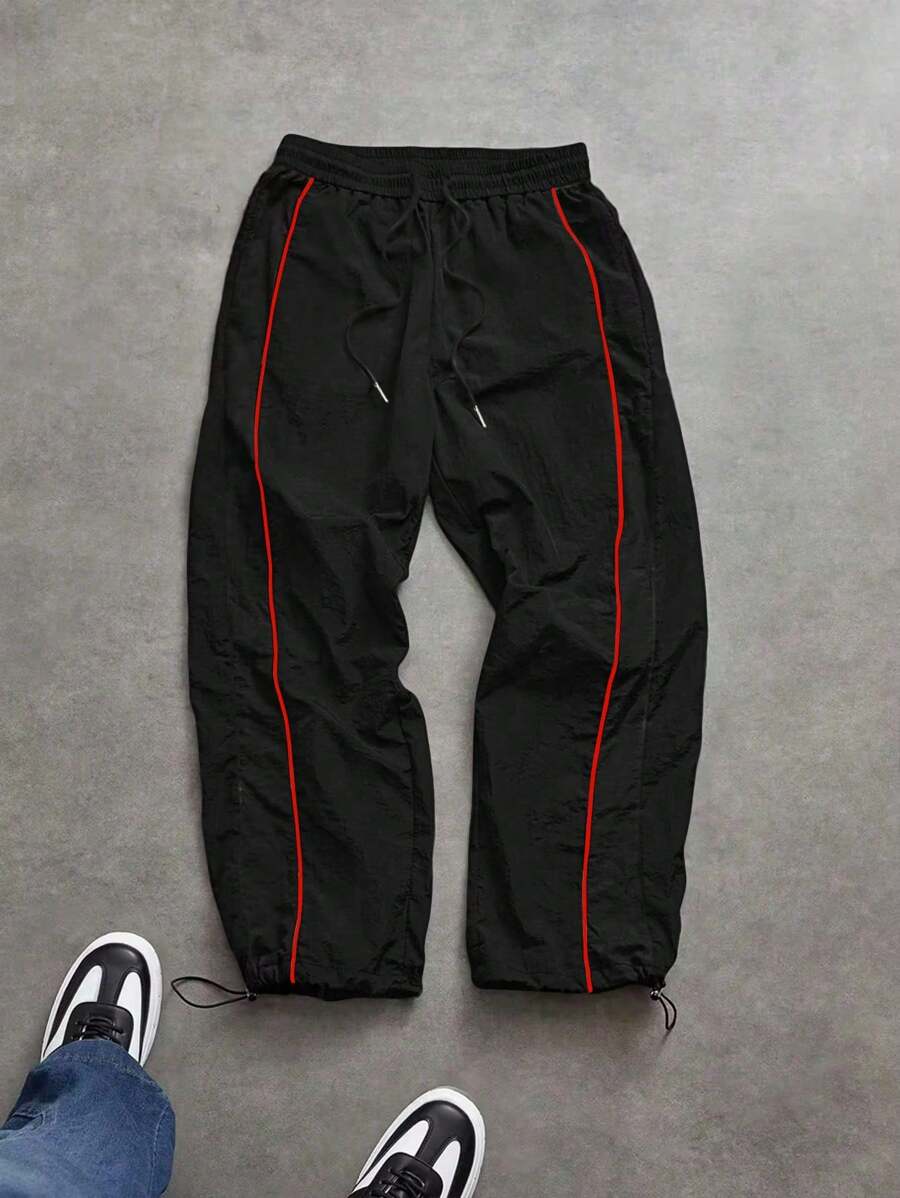 Manfinity EMRG Men's Black Cropped Sports Pants With Red Trim And Zipper Detail Windbreaker Pants Men Athletic Pants Track Pant Nylon Pants Parachute Pants Sweat Pants - Black - View 1