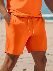 Manfinity Dauomo Conjunto de camisa polo de manga corta de unicolor y shorts con cordón para hombre
