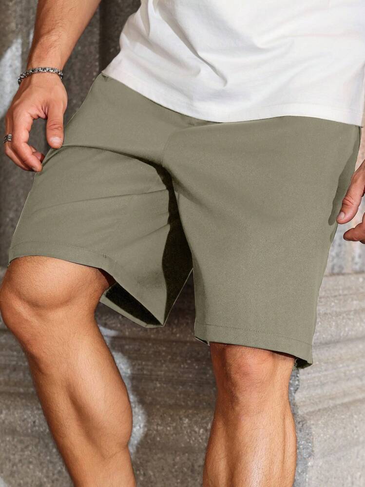 Manfinity Homme شورتات رجالية بحجم كبير ذات لون واحد وجيوب، فضفاضة وكاجوال - أخضر - مشاهدة 5