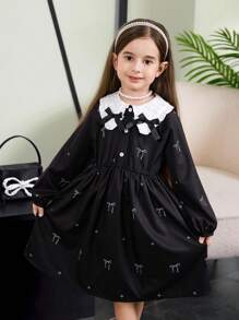 年轻女孩拼色蝴蝶结装饰连衣裙