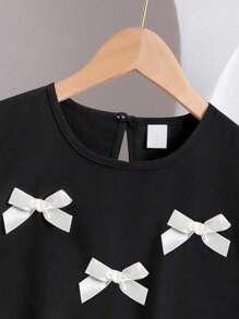 SHEIN Elladie kids 2 件套幼儿女童时尚可爱 3D 蝴蝶结装饰无袖背心和七分裤套装，适合日常穿着、度假和外出，春夏季 - 黑色 - 查看 6