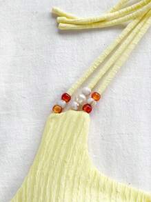 Soleia Top ajustado de tirantes en V con espalda descubierta y decoración de perlas, color amarillo, adecuado para playa, vacaciones, festivales de música, estilo bohemio - Amarillo - Ver 3