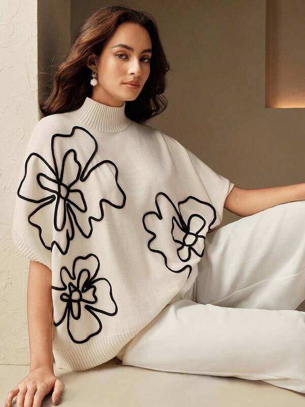 Anewsta Top de punto con bordado floral, cuello alto y mangas tipo murciélago para mujer