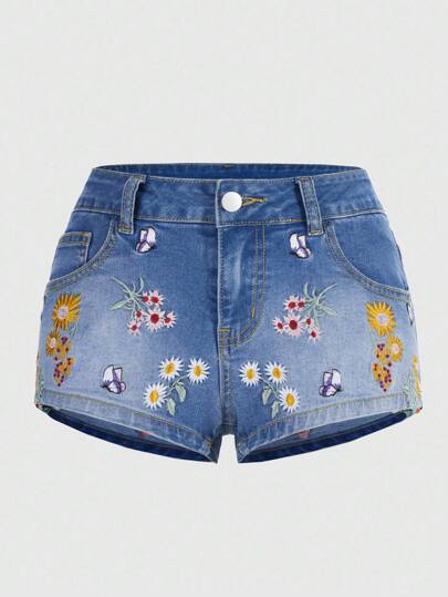 شورتات جينز مطرزة بزهور الاقحوان بخصر منخفض جدًا للنساء