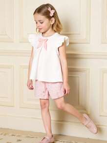 SHEIN Conjunto de 2 piezas estilo pastoral lindo para niña joven: Top con moño de color contrastante + Pantalones cortos con estampado floral, look fresco y casual, primavera y verano - Rosa - Ver 3