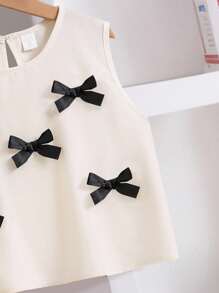 SHEIN Elladie kids 2 件套幼儿女童时尚可爱 3D 蝴蝶结装饰无袖背心和七分裤套装，适合日常穿着、度假和外出，春夏季