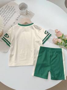 SHEIN 2 件套休闲时尚可爱花卉印花女式 T 恤上衣和短裤套装，采用经典加州洛杉矶印花设计，适合夏季 - 彩色 - 查看 5