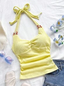 Soleia Top ajustado de tirantes en V con espalda descubierta y decoración de perlas, color amarillo, adecuado para playa, vacaciones, festivales de música, estilo bohemio - Amarillo - Ver 1